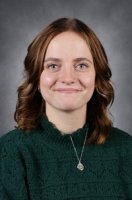 Picture of a person with a green shirt