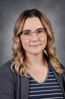Picture of a woman with a black/white stripe shirt