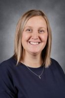 Picture of a person with a dark blue shirt